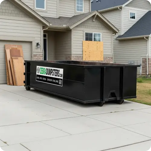 Zebra Dumpsters truck at residential location